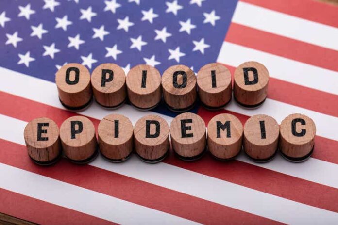 Opioid Epidemic Text On Cork Over American Flag