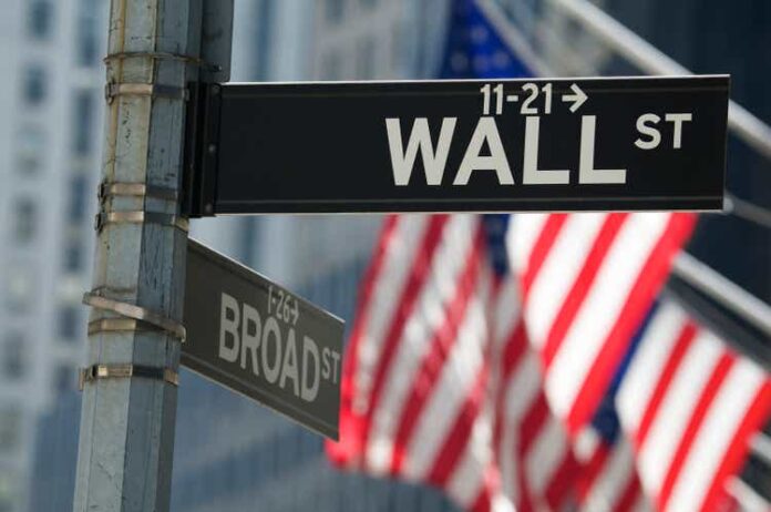 Wall Street Sign with American Flags