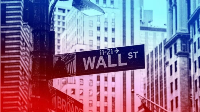 Street sign for Wall Street in New York City, with tall buildings in the background