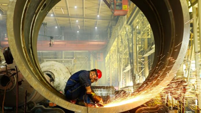 China’s economy expands at slowest pace in a year