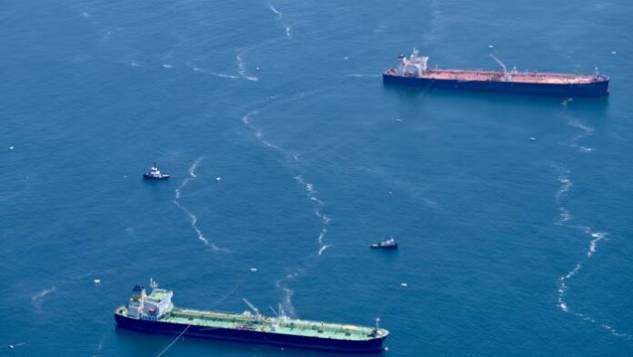  Aerial view of tankers waiting offshore to enter the Port of Los Angeles, California
