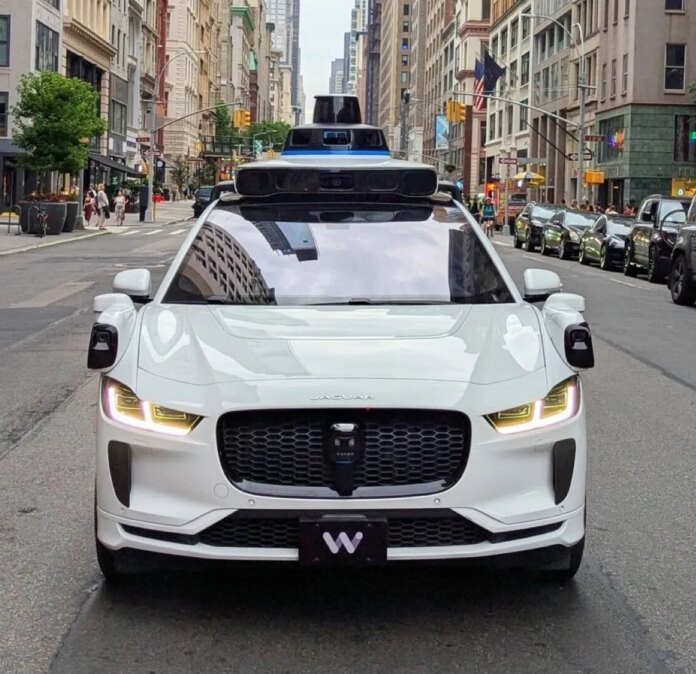 Regulators probe Waymo after its robotaxi drove around a stopped school bus